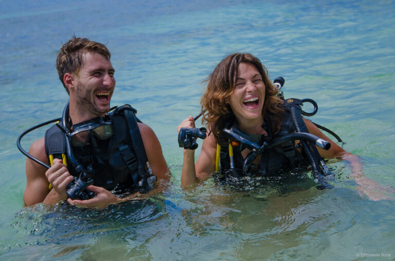 A happy scuba diving couple